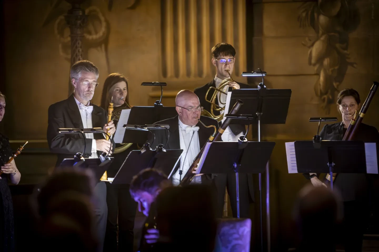 Image of musicians playing period woodwind instruments