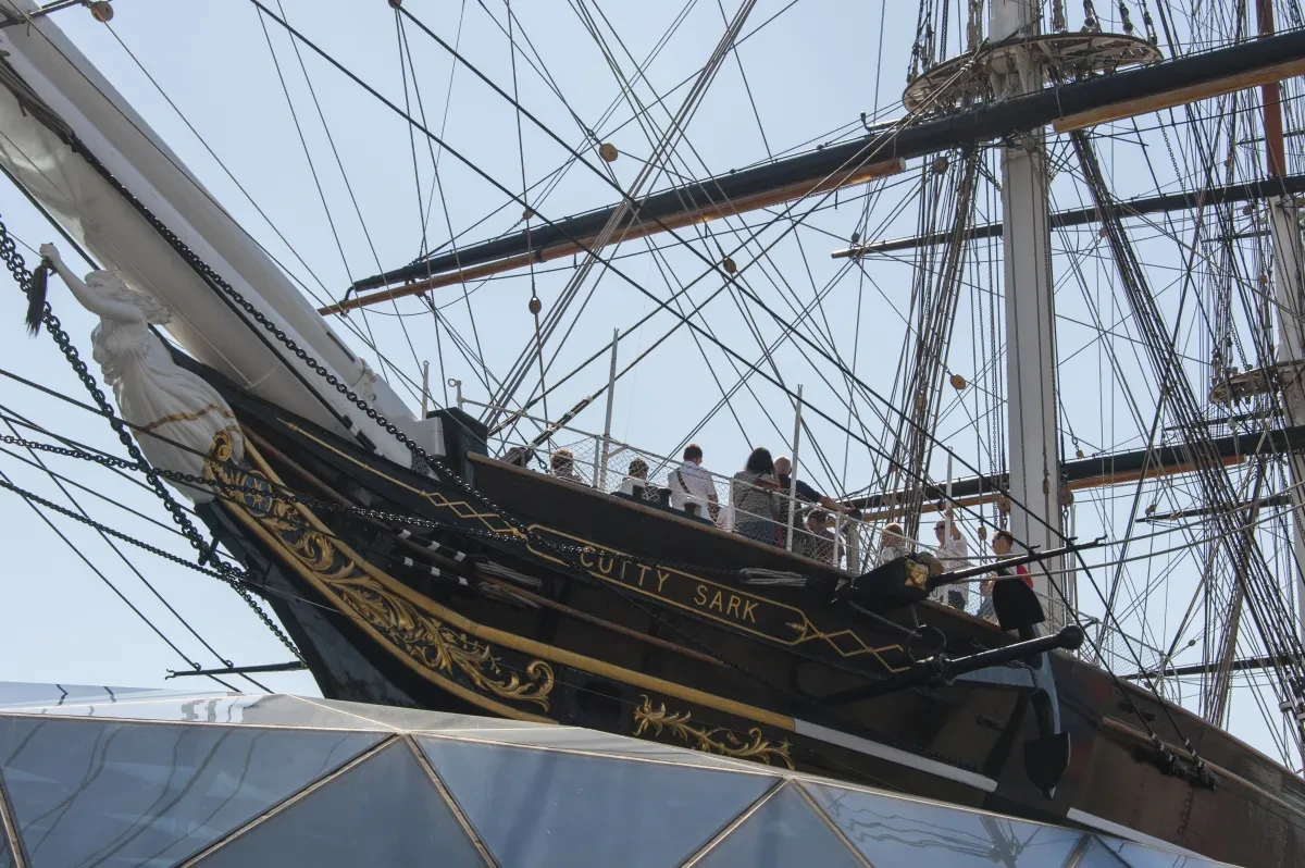 Bow view of Cutty Sark with carved figurehead 'Nannie' and rigging