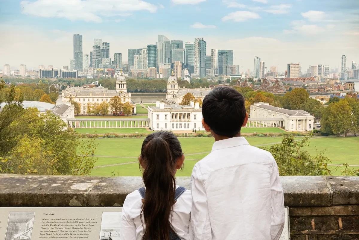 Two children look at a London vista.