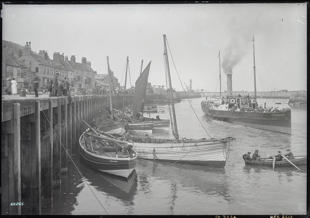 Photograph of paddlesteamer Scarborough laden with passengers in Whitby harbour.