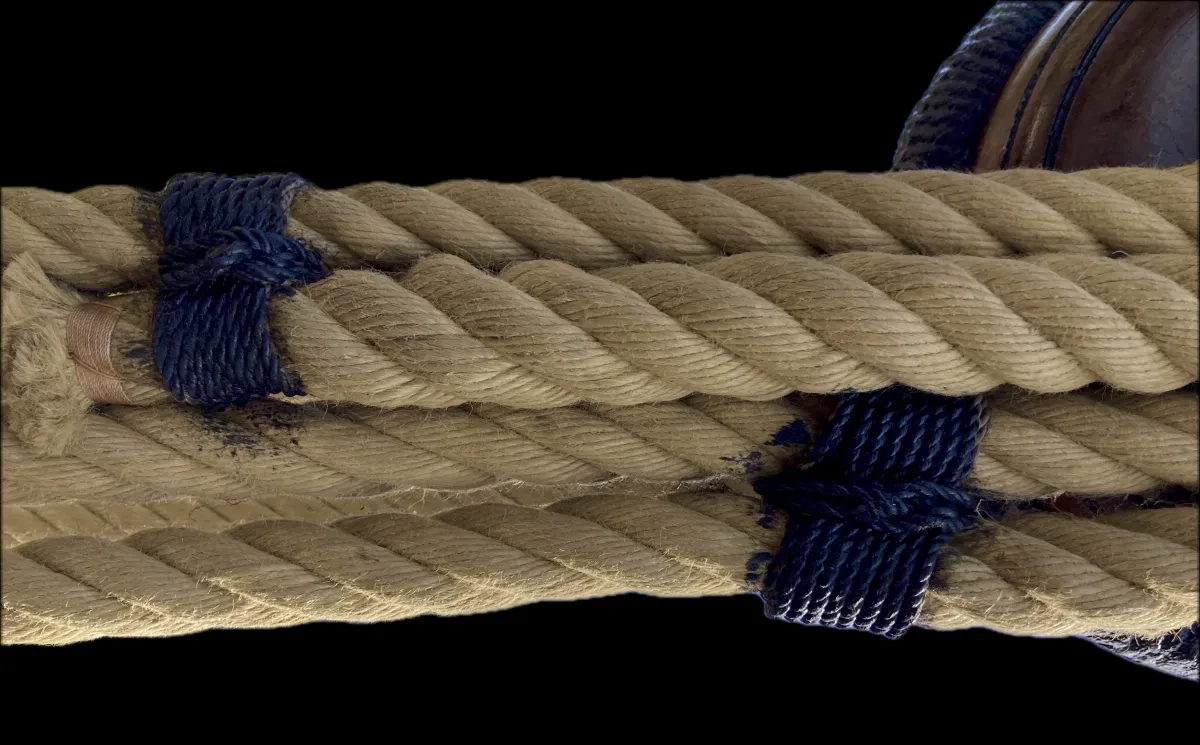 4 pieces of rope with seizing which is black section on them