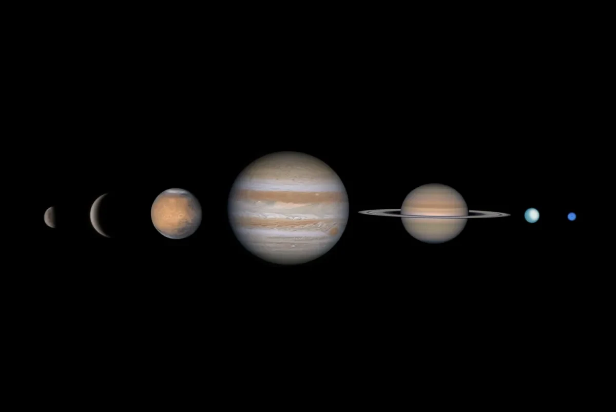 The planets shown side-by-side in a black sky.