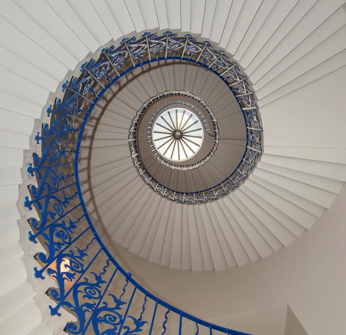 Looking up the white and blue spiral Tulip Stairs in the Queen's House.